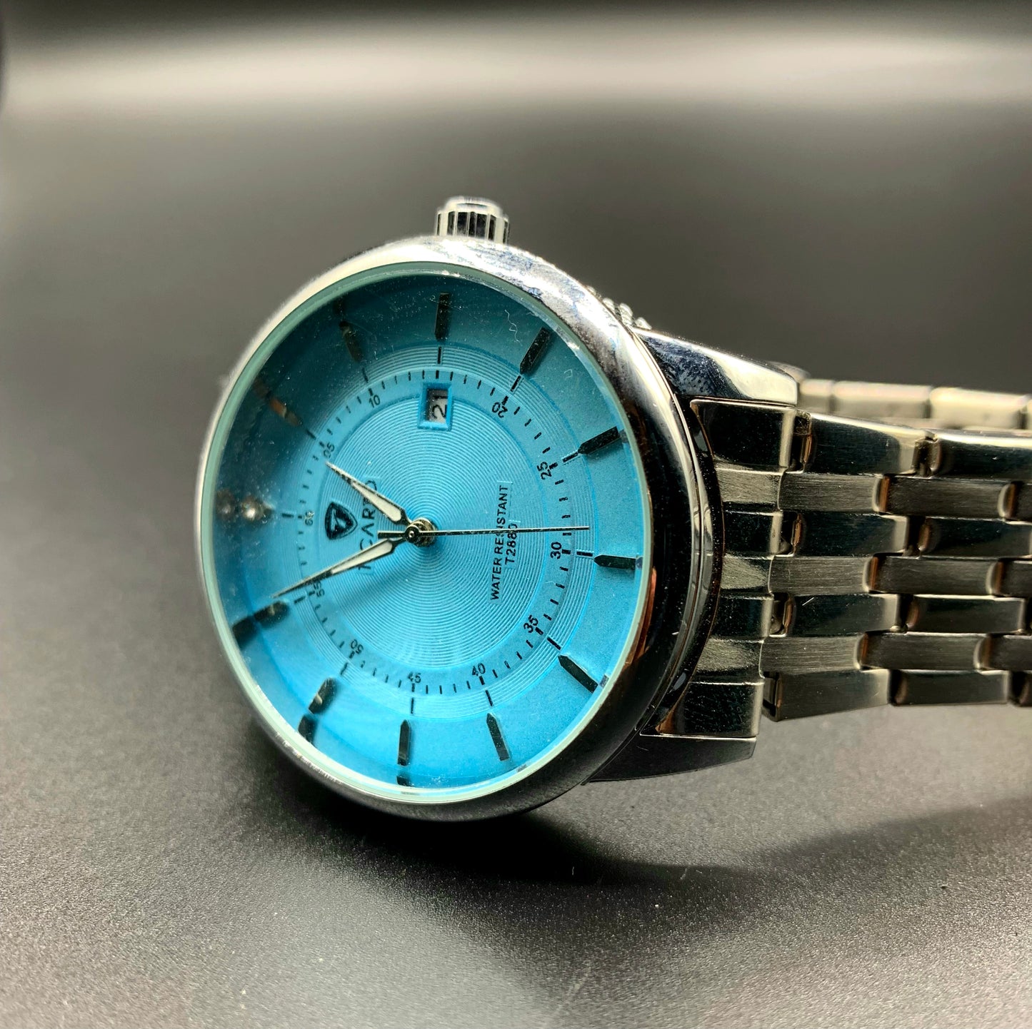 TICAO Men's Stainless Steel Watch with Light Blue Dial and Date Display