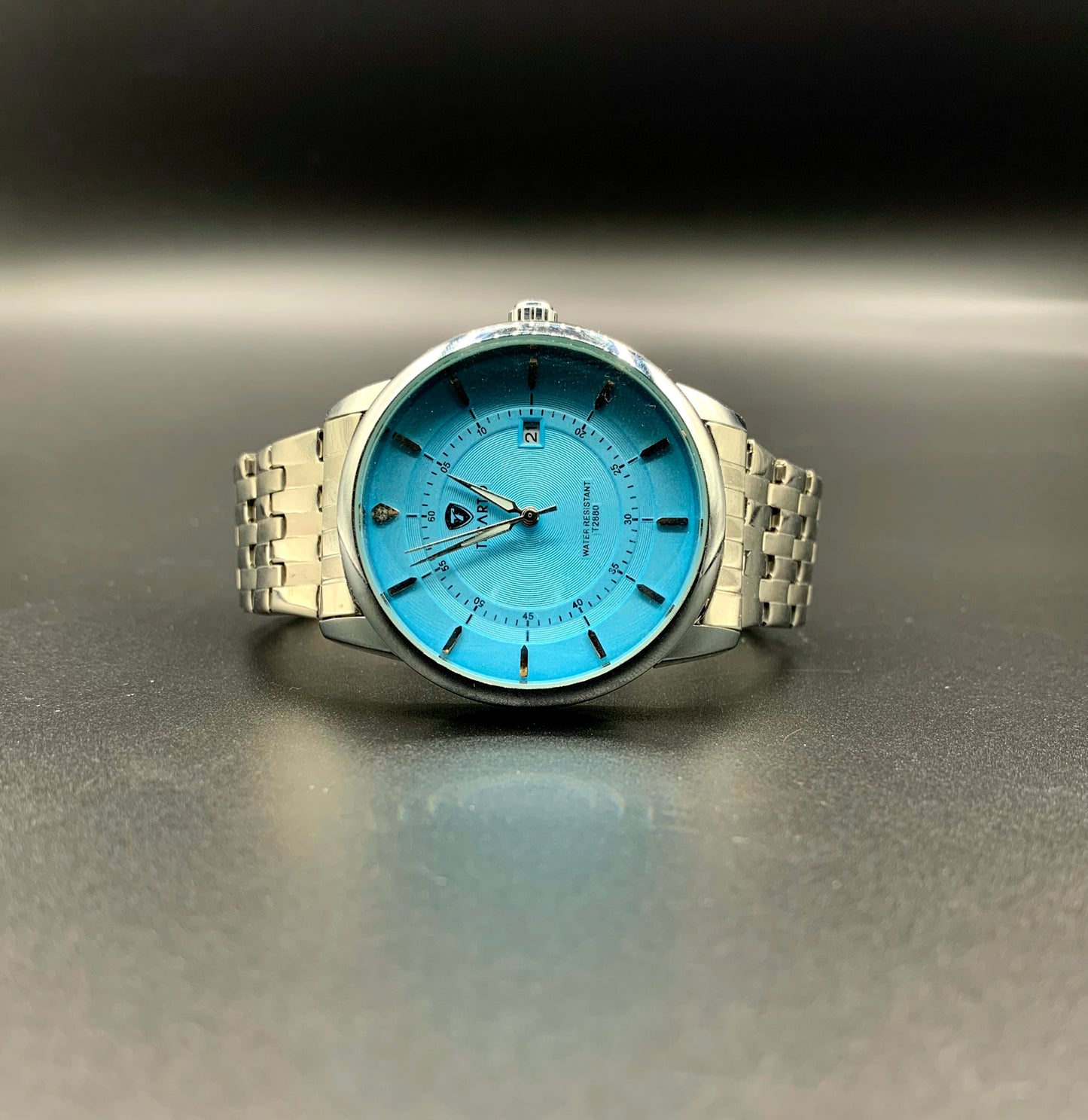 TICAO Men's Stainless Steel Watch with Light Blue Dial and Date Display